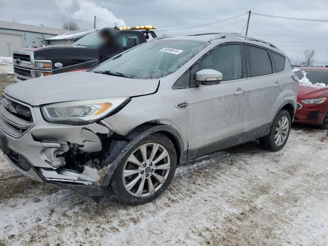 FORD ESCAPE TIT 2017 with VIN 1FMCU0J95HUA77090 - Photo from auction