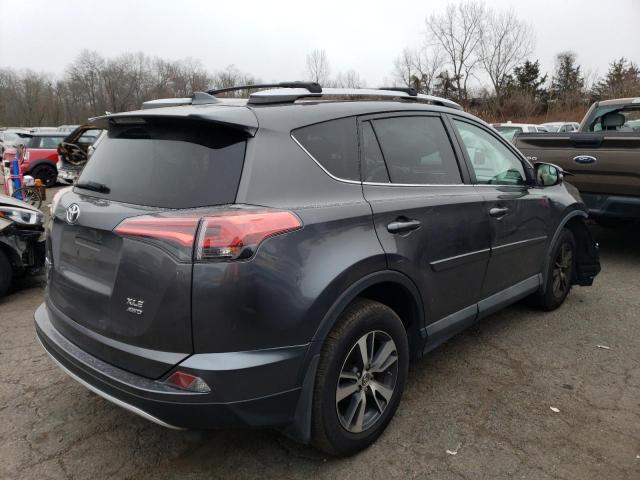 Photo 3 from auction – 2016 TOYOTA RAV4 XLE with VIN 2T3RFREV7GW505764