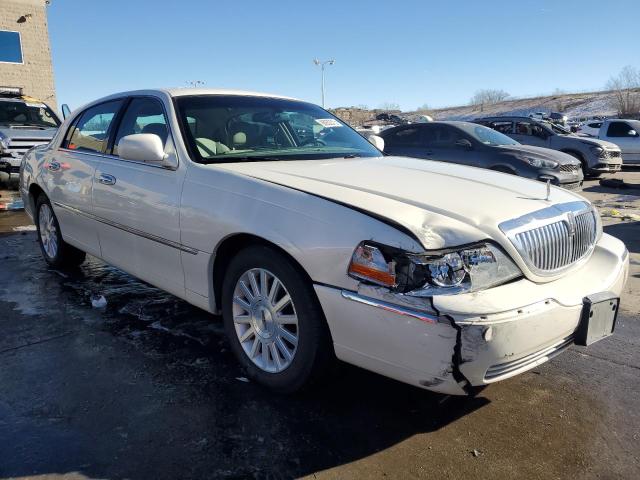 Photo 4 from auction – 2003 LINCOLN TOWN CAR E with VIN 1LNHM81W73Y669991