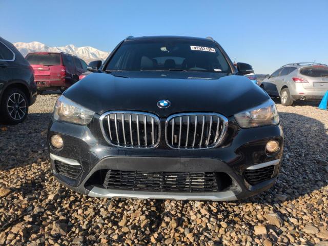 Photo 5 from auction – 2018 BMW X1 XDRIVE2 with VIN WBXHT3C31J5K27772