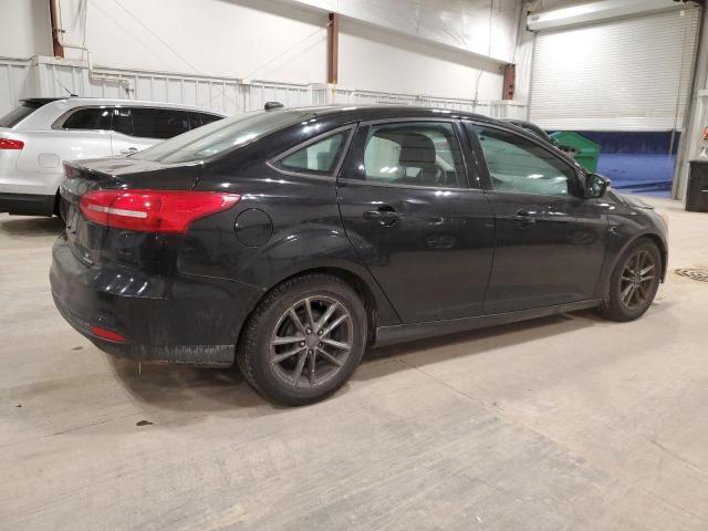 Photo 3 from auction – 2016 FORD FOCUS SE with VIN 1FADP3F21GL255293