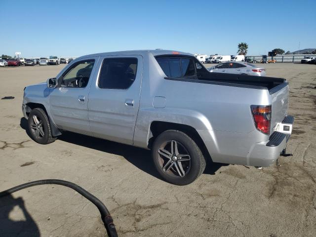 Photo 2 from auction – 2006 HONDA RIDGELINE with VIN 2HJYK16526H537801