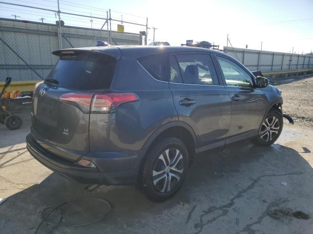 Photo 3 from auction – 2017 TOYOTA RAV4 LE with VIN JTMBFREV9HJ709998