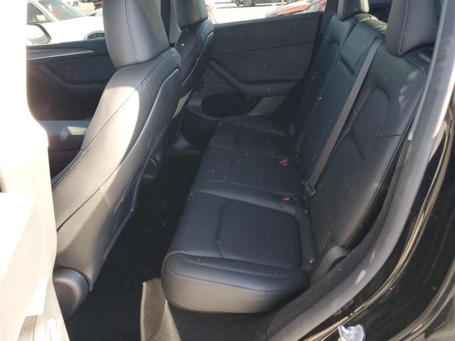 Photo 11 from auction – 2024 TESLA MODEL Y with VIN 7SAYGDEFXRF077401