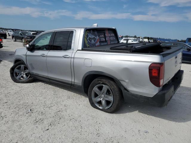 Photo 2 from auction – 2022 HONDA RIDGELINE with VIN 5FPYK3F77NB023200