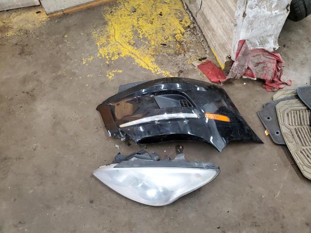 Photo 13 from auction – 2011 HYUNDAI ELANTRA TO with VIN KMHDB8AE0BU098992