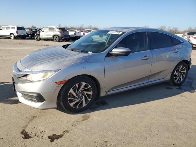 HONDA CIVIC EX 2016 con VIN 2HGFC2F73GH512988 - Foto de la subasta