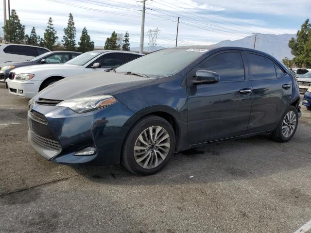 TOYOTA COROLLA L 2017 with VIN 5YFBURHE7HP692700 - Photo from auction