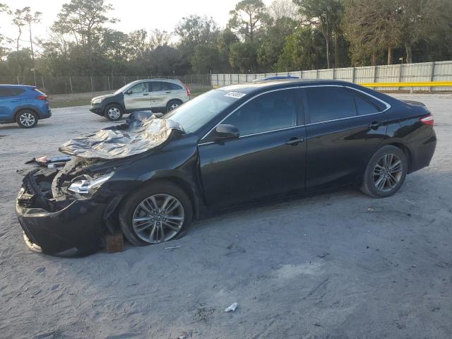 TOYOTA CAMRY LE 2017 with VIN 4T1BF1FK6HU807872 - Photo from auction