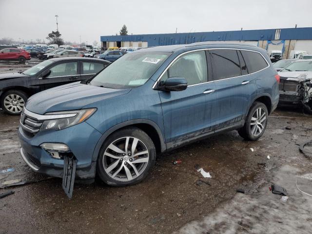 HONDA PILOT ELIT 2017 with VIN 5FNYF6H06HB049371 - Photo from auction