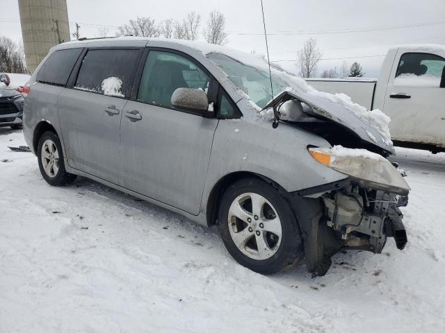 Photo 4 from auction – 2014 TOYOTA SIENNA LE with VIN 5TDKK3DC3ES412166