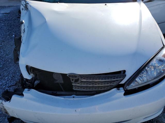 Photo 11 from auction – 2002 TOYOTA CAMRY LE with VIN 4T1BF30K32U006019