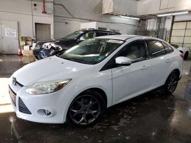 FORD FOCUS SE 2014 with VIN 1FADP3F28EL212129 - Photo from auction