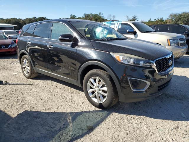 Photo 4 from auction – 2016 KIA SORENTO LX with VIN 5XYPG4A34GG030164