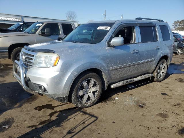 HONDA PILOT TOUR 2014 with VIN 5FNYF4H92EB016978 - Photo from auction