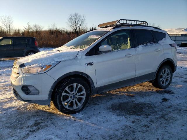 FORD ESCAPE SE 2018 with VIN 1FMCU9GD1JUC46365 - Photo from auction