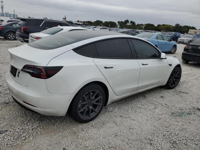 Photo 3 from auction – 2022 TESLA MODEL 3 with VIN 5YJ3E1EB3NF184308