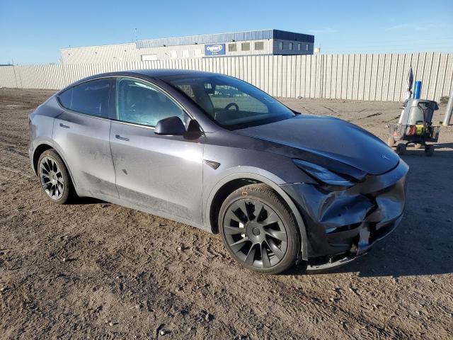 Photo 4 from auction – 2022 TESLA MODEL Y with VIN 7SAYGAEE2NF328699