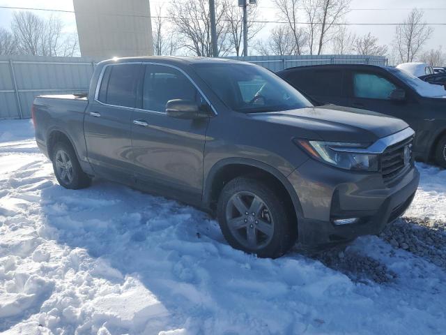 Photo 4 from auction – 2022 HONDA RIDGELINE with VIN 5FPYK3F70NB011695