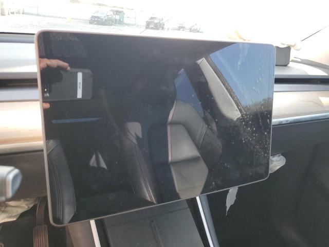 Photo 9 from auction – 2021 TESLA MODEL Y with VIN 5YJYGDEE8MF070038