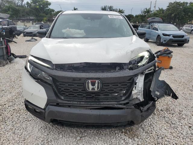 Photo 5 from auction – 2021 HONDA PASSPORT E with VIN 5FNYF7H55MB007768