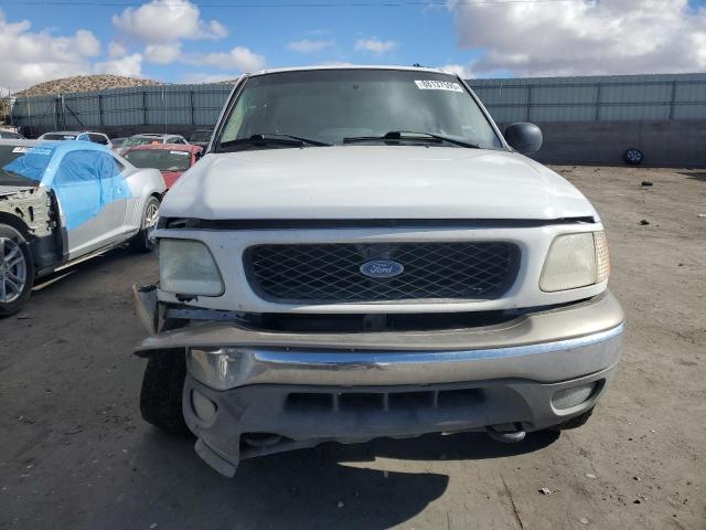 Photo 5 from auction – 2004 FORD F-150 HERI with VIN 2FTRX18W14CA71689