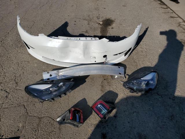 Photo 12 from auction – 2022 TESLA MODEL 3 with VIN 5YJ3E1EC1NF106389