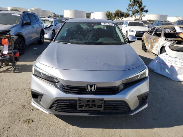 Photo 5 from auction – 2023 HONDA CIVIC LX with VIN 2HGFE2F23PH561252
