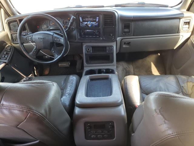 Photo 8 from auction – 2003 GMC YUKON with VIN 1GKEC13Z93J107323