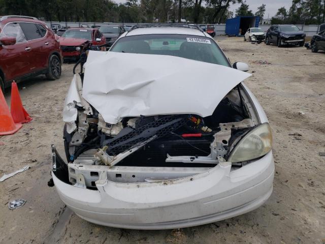 Photo 5 from auction – 2003 FORD TAURUS SE with VIN 1FAFP58SX3A159539