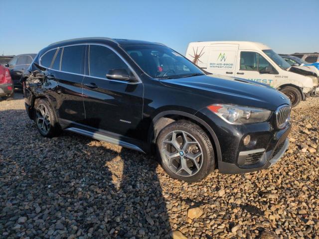 Photo 4 from auction – 2018 BMW X1 XDRIVE2 with VIN WBXHT3C31J5K27772