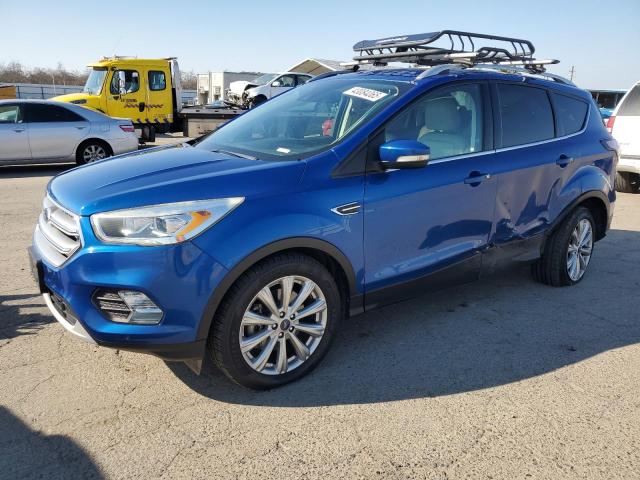FORD ESCAPE TIT 2017 with VIN 1FMCU0J92HUC27107 - Photo from auction