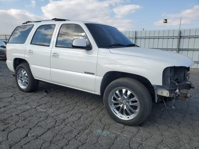 Photo 4 from auction – 2003 GMC YUKON with VIN 1GKEC13T93R318454