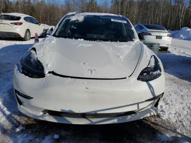 Photo 5 from auction – 2021 TESLA MODEL 3 with VIN 5YJ3E1EA9MF981703