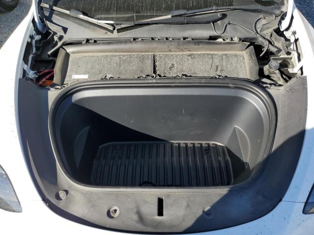 Photo 11 from auction – 2023 TESLA MODEL Y with VIN 7SAYGDEE8PF803678
