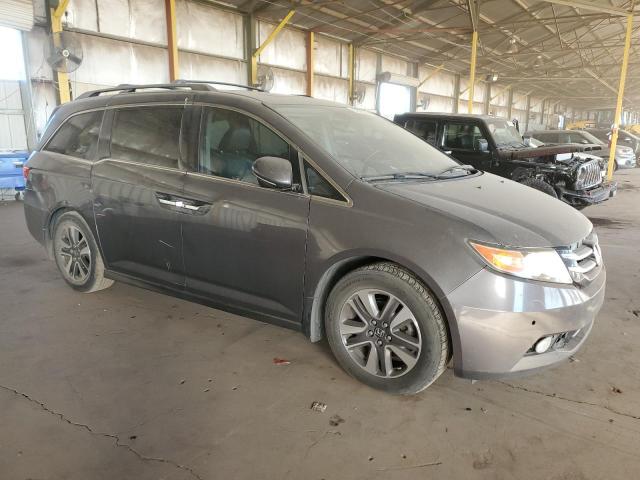Photo 4 from auction – 2014 HONDA ODYSSEY TO with VIN 5FNRL5H98EB024795