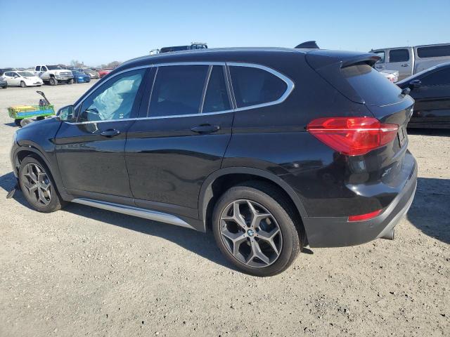 Photo 2 from auction – 2018 BMW X1 XDRIVE2 with VIN WBXHT3C32J5L29503