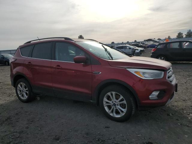 Photo 4 from auction – 2018 FORD ESCAPE SE with VIN 1FMCU9GD8JUA57678