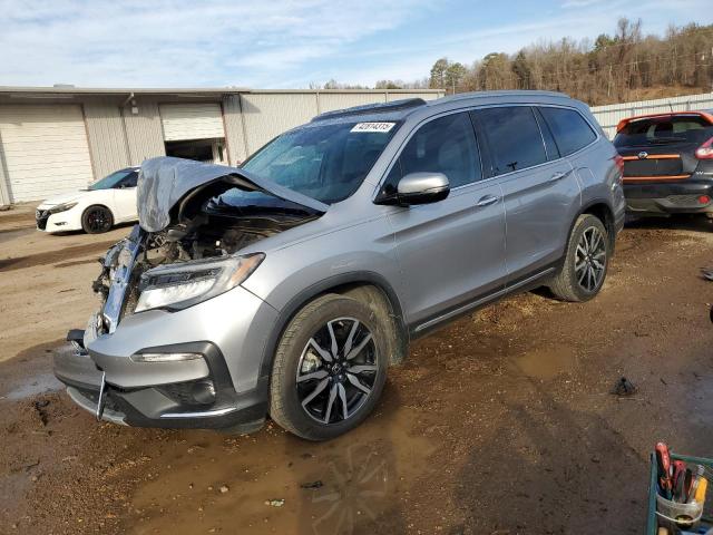 HONDA PILOT TOUR 2019 with VIN 5FNYF5H6XKB034135 - Photo from auction
