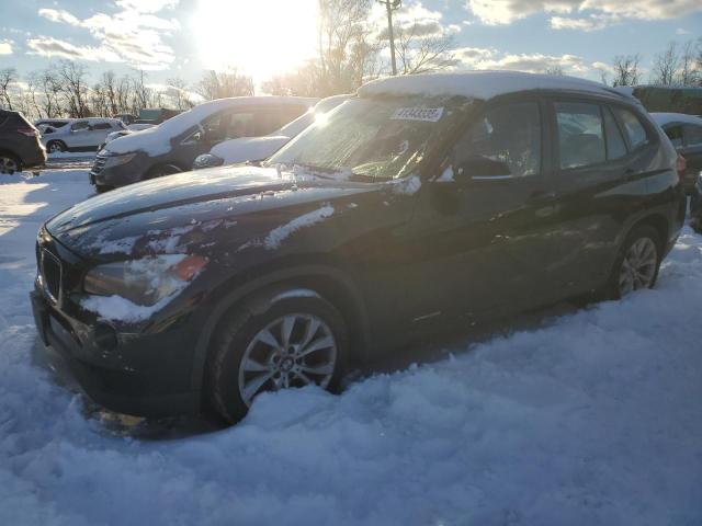 BMW X1 XDRIVE2 2013 with VIN WBAVL1C5XDVR86704 - Photo from auction