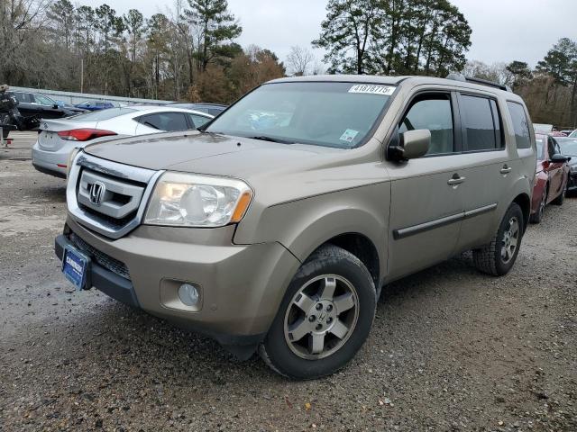 HONDA PILOT TOUR 2011 with VIN 5FNYF3H91BB011003 - Photo from auction