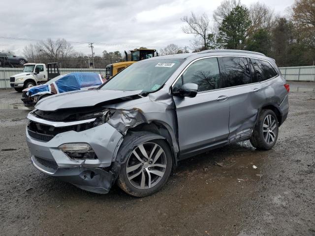 HONDA PILOT ELIT 2016 with VIN 5FNYF6H07GB105140 - Photo from auction
