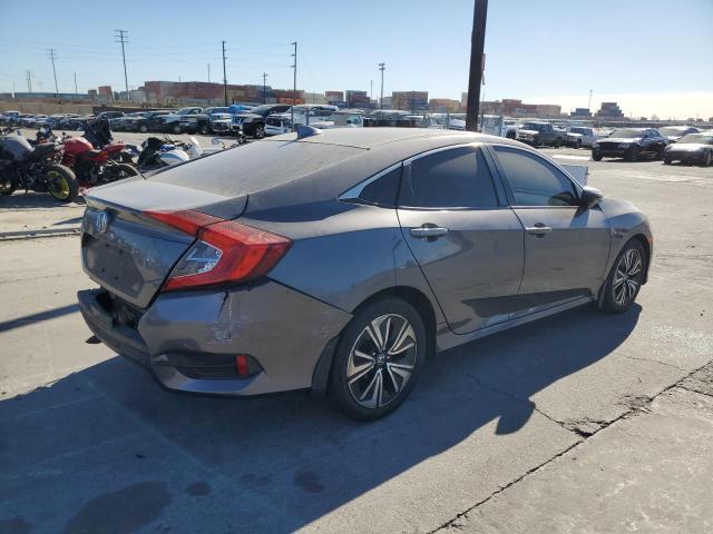 Photo 3 from auction – 2017 HONDA CIVIC EX with VIN 2HGFC1F3XHH631887