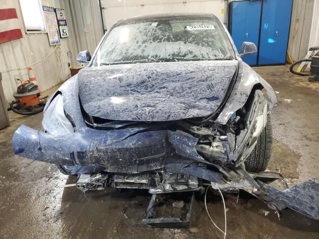 Photo 5 from auction – 2022 TESLA MODEL 3 with VIN 5YJ3E1EA3NF369112