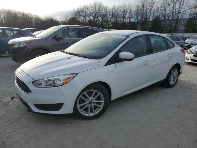 FORD FOCUS SE 2016 with VIN 1FADP3F24GL215077 - Photo from auction