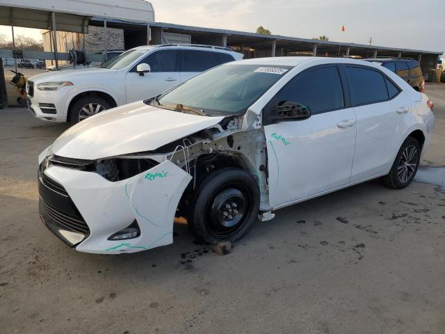 TOYOTA COROLLA L 2017 with VIN 5YFBURHE4HP602547 - Photo from auction