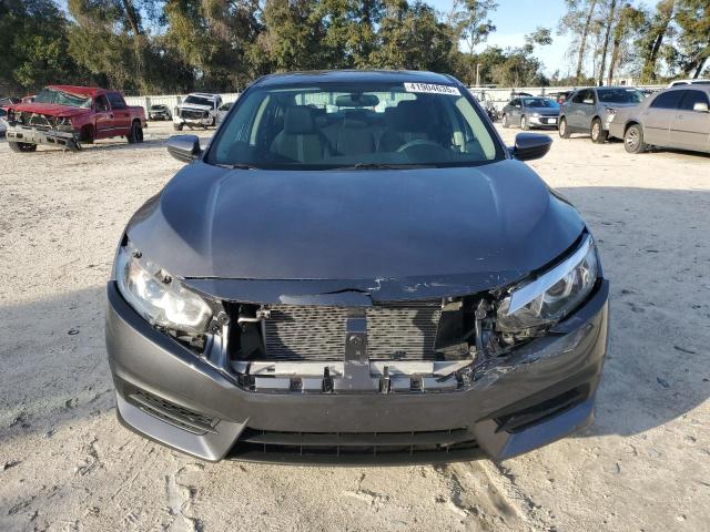 Photo 5 from auction – 2018 HONDA CIVIC LX with VIN 19XFC2F58JE209799