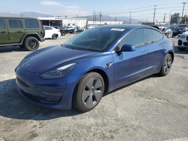 TESLA MODEL 3 2021 with VIN 5YJ3E1EA7MF875234 - Photo from auction