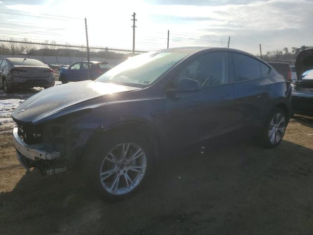 TESLA MODEL Y 2024 with VIN 7SAYGAEE4RF077822 - Photo from auction