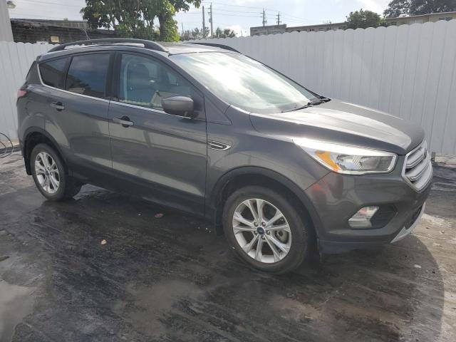 Photo 4 from auction – 2018 FORD ESCAPE SE with VIN 1FMCU9GD6JUD06012